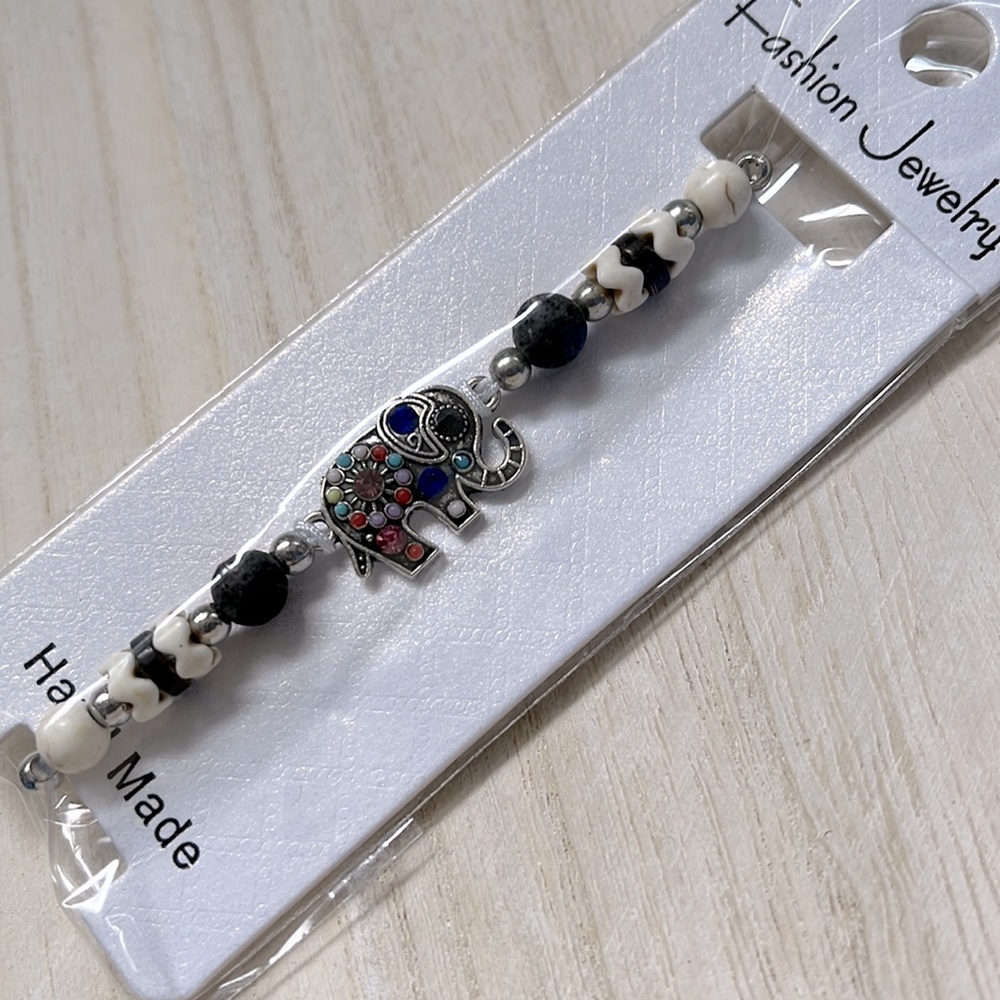 NWT - Never worn, Beaded pull string bracelet with elephant charm